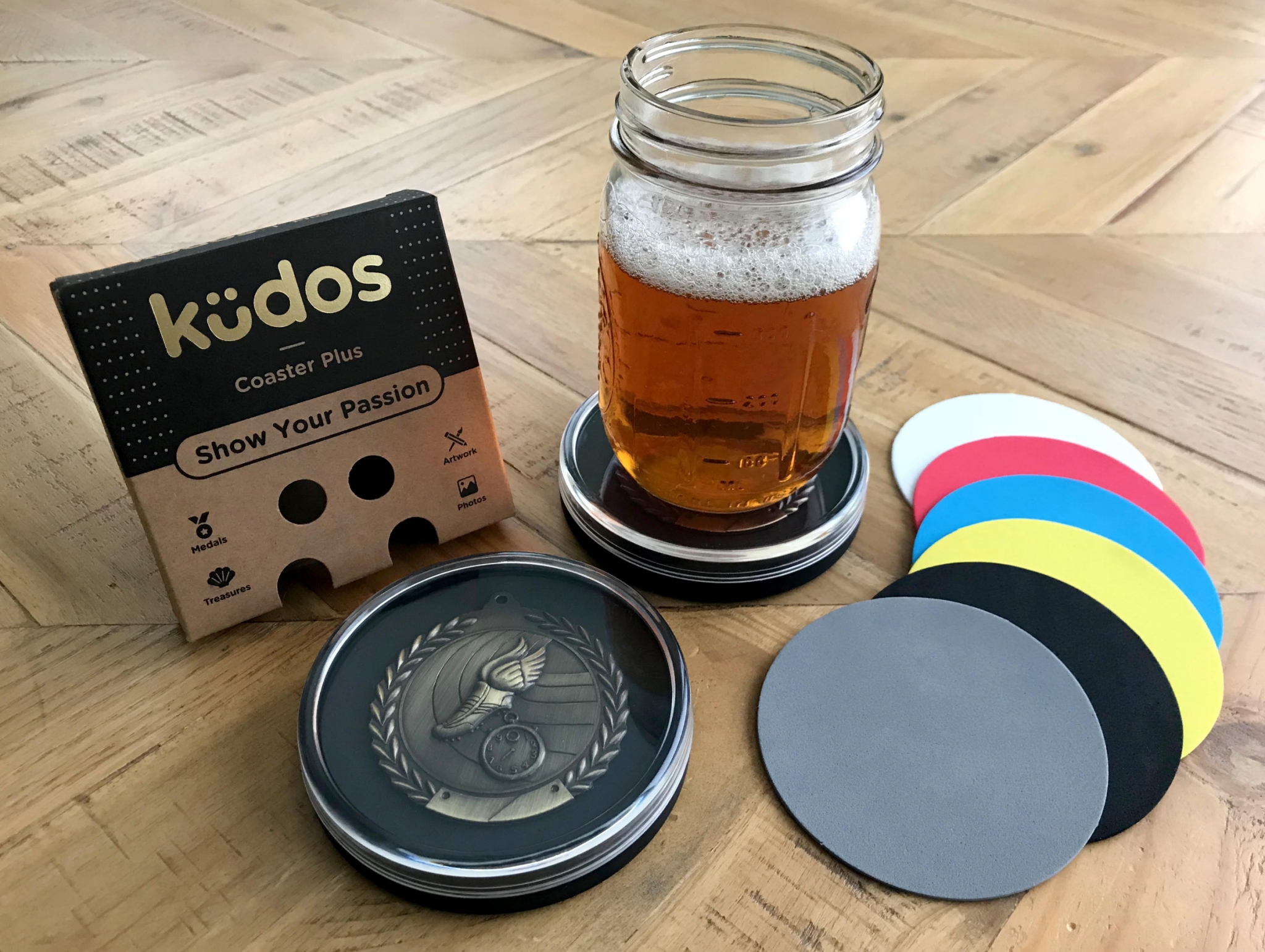 Kudos medal coaster on a tabletop